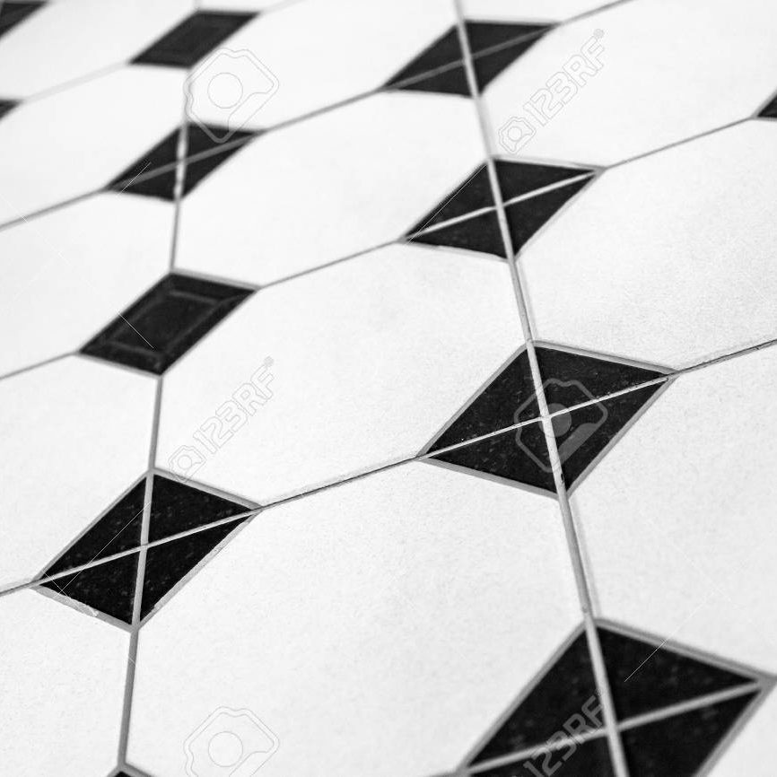 Black and white colored mosaic background tiles. Close up cleaning black and white mosaic tiles shower wall texture background
